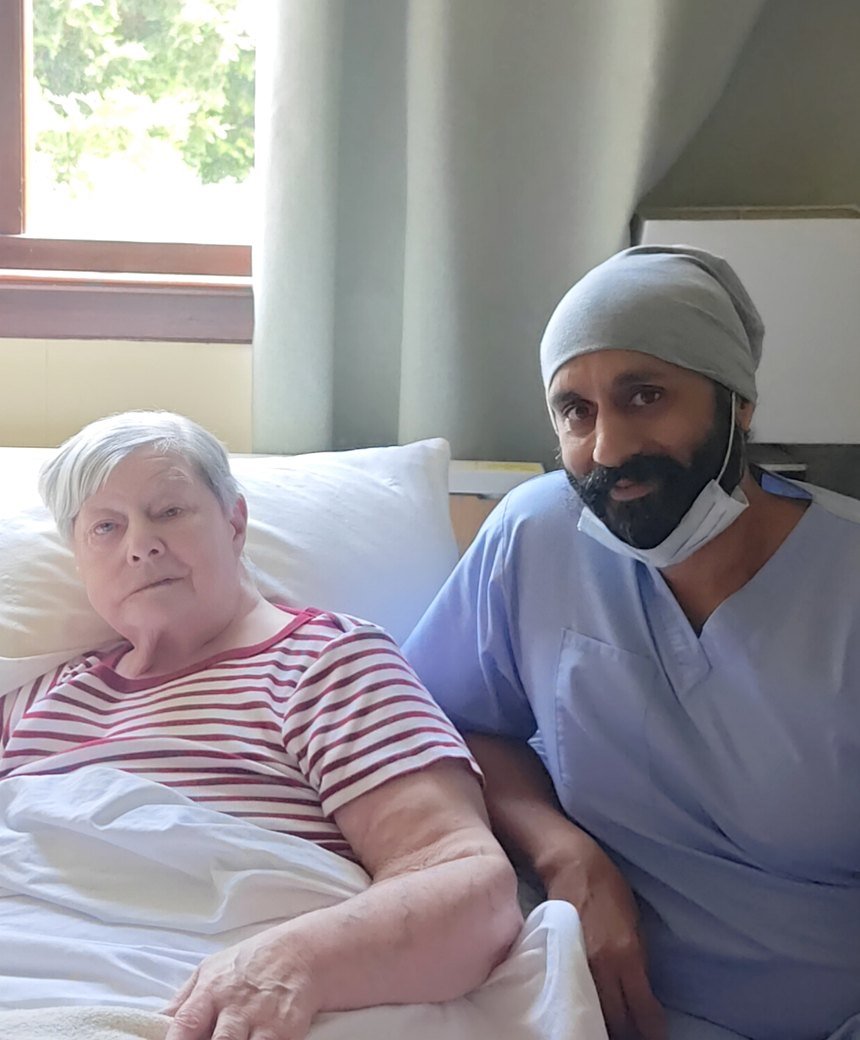 Mobile dentist caring for a patient at home in Manchester